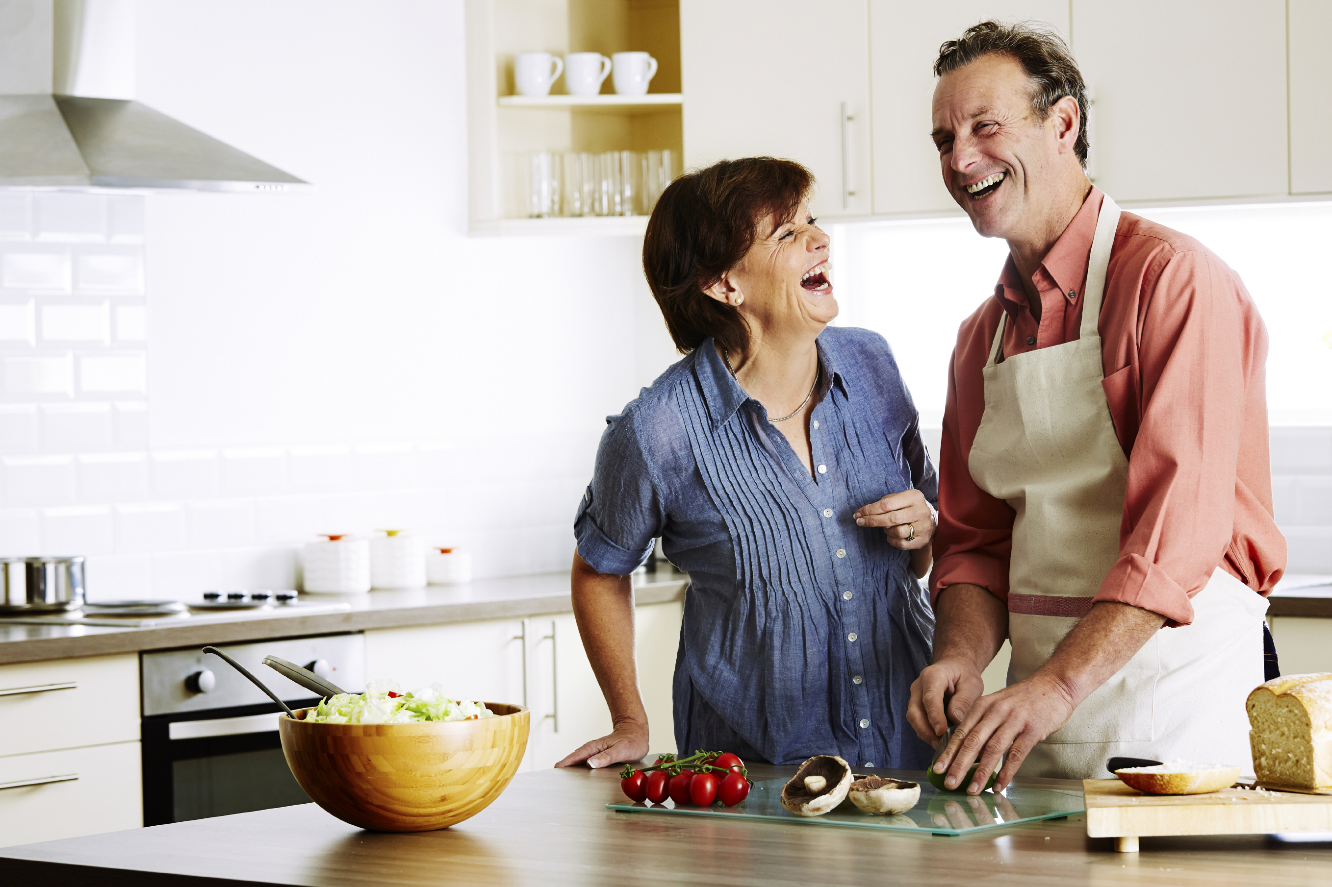 Japanese Mature Couple In The Kitchen Stock Photo