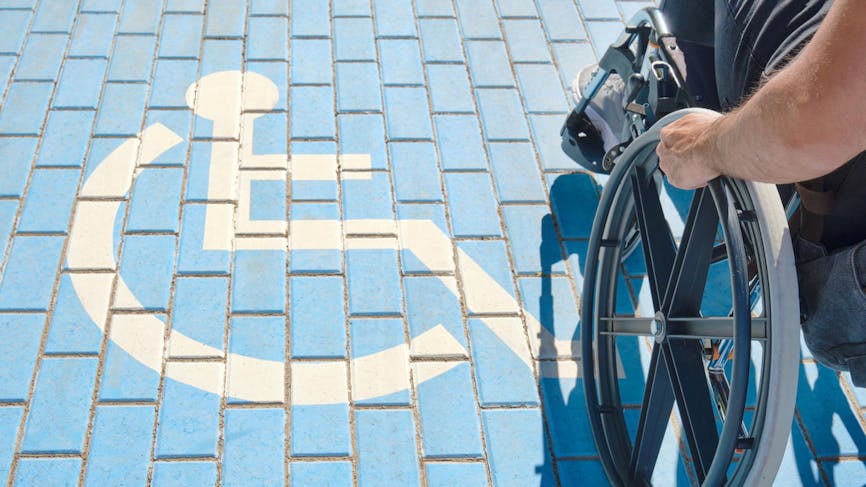 Stationnement, logo d'une personne handicapée